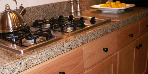 Oak Kitchen Cabinets with Granite Tile Countertops